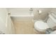 Clean bathroom with a toilet and bathtub at 700 Oak St, Charlotte, NC 28214