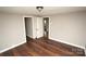 Spacious bedroom with hardwood floors and neutral-toned walls at 700 Oak St, Charlotte, NC 28214