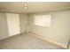 Unfinished bonus room with neutral walls and carpeting at 700 Oak St, Charlotte, NC 28214