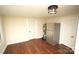 View of a kitchen with wood flooring and appliances at 700 Oak St, Charlotte, NC 28214