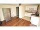 Modern kitchen with stainless steel appliances and white cabinets at 700 Oak St, Charlotte, NC 28214