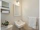 Cozy bathroom features a classic vanity, neutral walls, and well-placed lighting at 833 Montford Dr, Charlotte, NC 28209