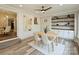 Spacious dining area with built-in shelving, ample natural light, and modern decor at 833 Montford Dr, Charlotte, NC 28209