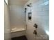 Walk-in shower with subway tile and a built-in seat at #89 Silver Trace Ln, Denver, NC 28037