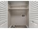 Empty laundry room with built-in shelving and hookups at 9153 Spyglass Pl # B, Charlotte, NC 28214