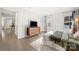 Bright bedroom with hardwood floors and a view of the kitchen at 9706 Hamel St, Charlotte, NC 28215