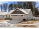 Two-car garage and front yard with charming curb appeal at 9706 Hamel St, Charlotte, NC 28215