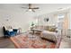 Living room with hardwood floors and comfortable seating at 9706 Hamel St, Charlotte, NC 28215