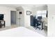 Well-lit bedroom with built-in workspace and additional storage at 9806 Penn Station St, Cornelius, NC 28031