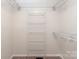 Spacious closet with wire shelving and hanging rods at 10237 Fairway Ridge Rd, Charlotte, NC 28277