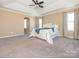 Spacious Primary bedroom with carpeted floors and neutral wall tones at 112 Meadowcreek Village Dr, Locust, NC 28097