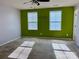 Bedroom with two large windows for natural light at 1148 Tangle Ridge Se Dr, Concord, NC 28025