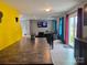 Kitchen with a breakfast bar overlooking the living and dining areas at 1148 Tangle Ridge Se Dr, Concord, NC 28025