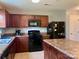 Kitchen boasts stainless appliances, lots of counter space, and ample cabinets at 1148 Tangle Ridge Se Dr, Concord, NC 28025