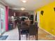 Bright eat-in kitchen with dark wood cabinets and a large island for extra prep space at 1148 Tangle Ridge Se Dr, Concord, NC 28025