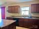 Kitchen featuring wood cabinets, modern appliances, and ample counter space at 1148 Tangle Ridge Se Dr, Concord, NC 28025