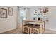 Small breakfast nook with four-person seating and cabinet samples at 12160 Lady Bell Dr, Charlotte, NC 28278