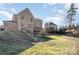 A spacious backyard with a deck is perfect for outdoor entertaining and relaxation at 14018 Promenade Dr, Huntersville, NC 28078