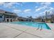 The large community pool with lap lanes is adjacent to the clubhouse at 14018 Promenade Dr, Huntersville, NC 28078