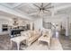 Open-concept design: living room flows seamlessly into a modern kitchen and foyer at 14018 Promenade Dr, Huntersville, NC 28078