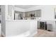 Modern kitchen with gray cabinets and white quartz countertops at 160 Bluffton Rd, Mooresville, NC 28115