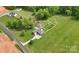 Expansive property featuring a well-maintained home, lush greenery, and ample land at 219 Society Rd, Statesville, NC 28625