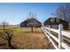 Spacious backyard with white vinyl fence at 219 Society Rd, Statesville, NC 28625