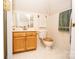 Simple bathroom with wood vanity and toilet at 219 Society Rd, Statesville, NC 28625