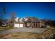 Attractive brick home with a multi-car garage and well-manicured lawn at 219 Society Rd, Statesville, NC 28625