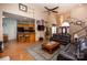 Open living room and kitchen with hardwood floors and comfortable seating at 219 Society Rd, Statesville, NC 28625