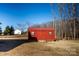 Red storage shed with metal roof and access ramp at 219 Society Rd, Statesville, NC 28625