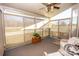 Bright sunroom featuring ample natural light and backyard views at 219 Society Rd, Statesville, NC 28625