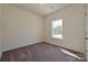 Well-lit bedroom with carpet flooring at 2226 Catawba Trace Dr, Catawba, NC 28609