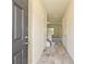 Bright entryway with tile flooring, leading to staircase and living areas at 2226 Catawba Trace Dr, Catawba, NC 28609