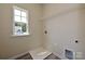 Laundry room with shelving and window at 2226 Catawba Trace Dr, Catawba, NC 28609