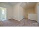 Upstairs hallway with carpet and access to bedrooms at 2226 Catawba Trace Dr, Catawba, NC 28609