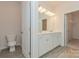 Double vanity bathroom with a large mirror and grey flooring at 2230 Catawba Trace Dr, Catawba, NC 28609