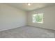 Well-lit bedroom featuring neutral walls and carpet at 2230 Catawba Trace Dr, Catawba, NC 28609