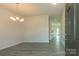 Simple dining room with light walls, hardwood floors, and a chandelier at 2230 Catawba Trace Dr, Catawba, NC 28609