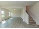 Open Gathering room with hardwood floors and a staircase at 2230 Catawba Trace Dr, Catawba, NC 28609