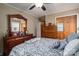 Spacious bedroom with dresser and ceiling fan at 2264 Country Club Rd, Lincolnton, NC 28092