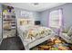 Bedroom with bookshelf and floral bedding at 2490 Westminster Dr, Rock Hill, SC 29732