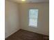 Simple bedroom with a window and carpet at 351 Haigler St, Rock Hill, SC 29732