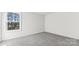 Bright bedroom with a view to the outdoors from the window at 355 Miramar Dr, York, SC 29745