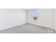 A bright bedroom with neutral carpet and natural light from the window at 355 Miramar Dr, York, SC 29745