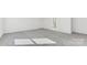 A bright bedroom with neutral carpet and an entrance to the bathroom at 355 Miramar Dr, York, SC 29745