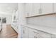 Kitchen showcasing sleek white cabinets, modern appliances, and ample counter space at 355 Miramar Dr, York, SC 29745