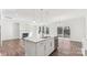 Bright kitchen featuring a center island, pendant lighting, and an open view of the living area at 355 Miramar Dr, York, SC 29745