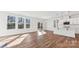 Spacious living area featuring large windows, hardwood floors, and an open floor plan at 355 Miramar Dr, York, SC 29745