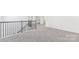 Open loft area features neutral carpet and railing at 355 Miramar Dr, York, SC 29745